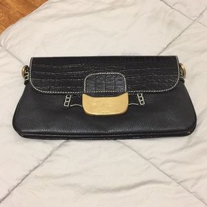 TOD’S clutch it’s in excellent condition